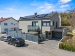 Hausansicht - Clean Chic – Energieeffizientes Einfamilienhaus mit Einliegerwohnung in KN-Wollmatingen